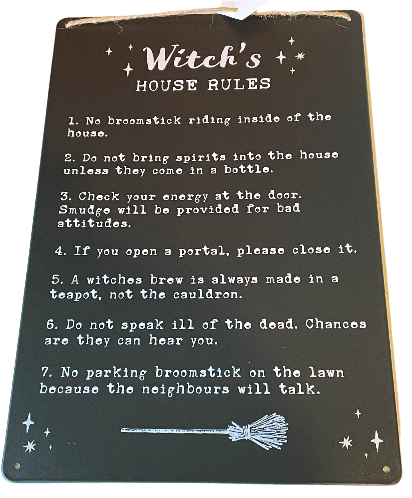 Witch’s house rules sign