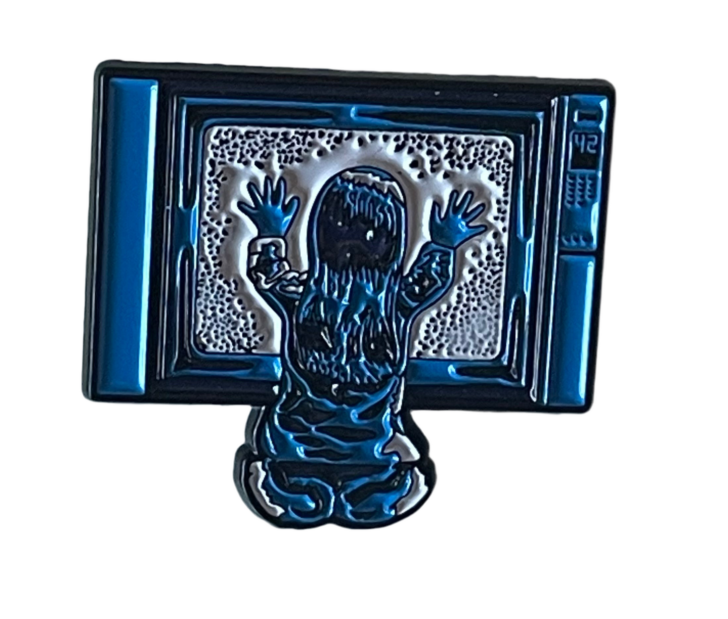 Poltergeist pin badge