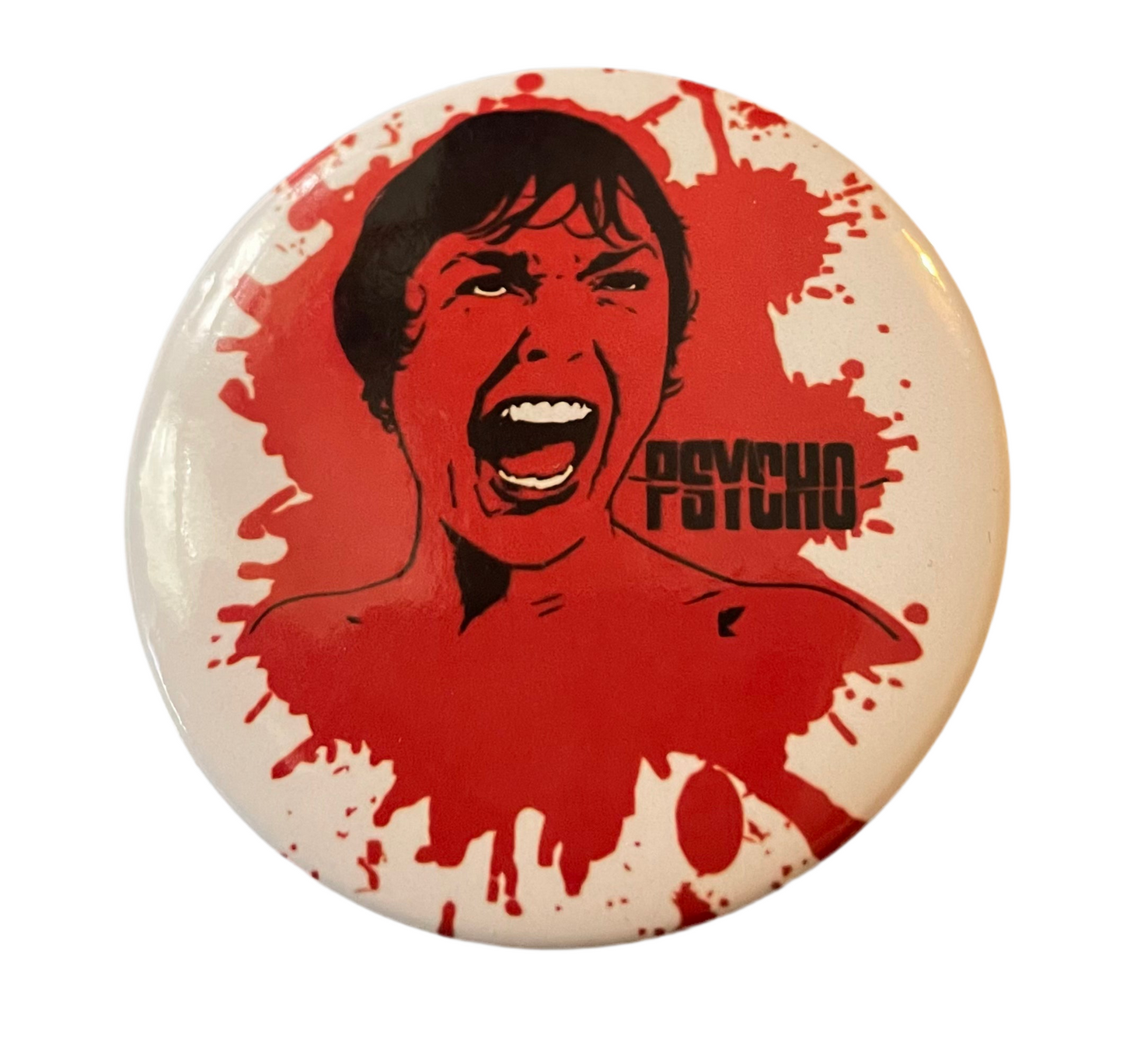 Psycho pin badge