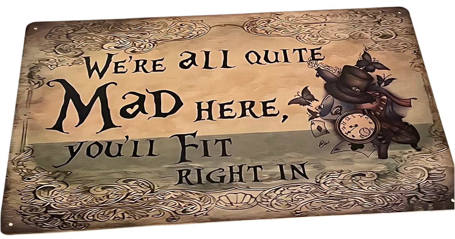 We’re all quite mad here, you’ll fit right in sign