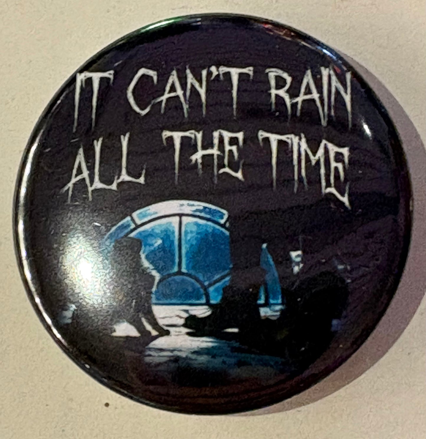 It can’t rain all the time pin badge