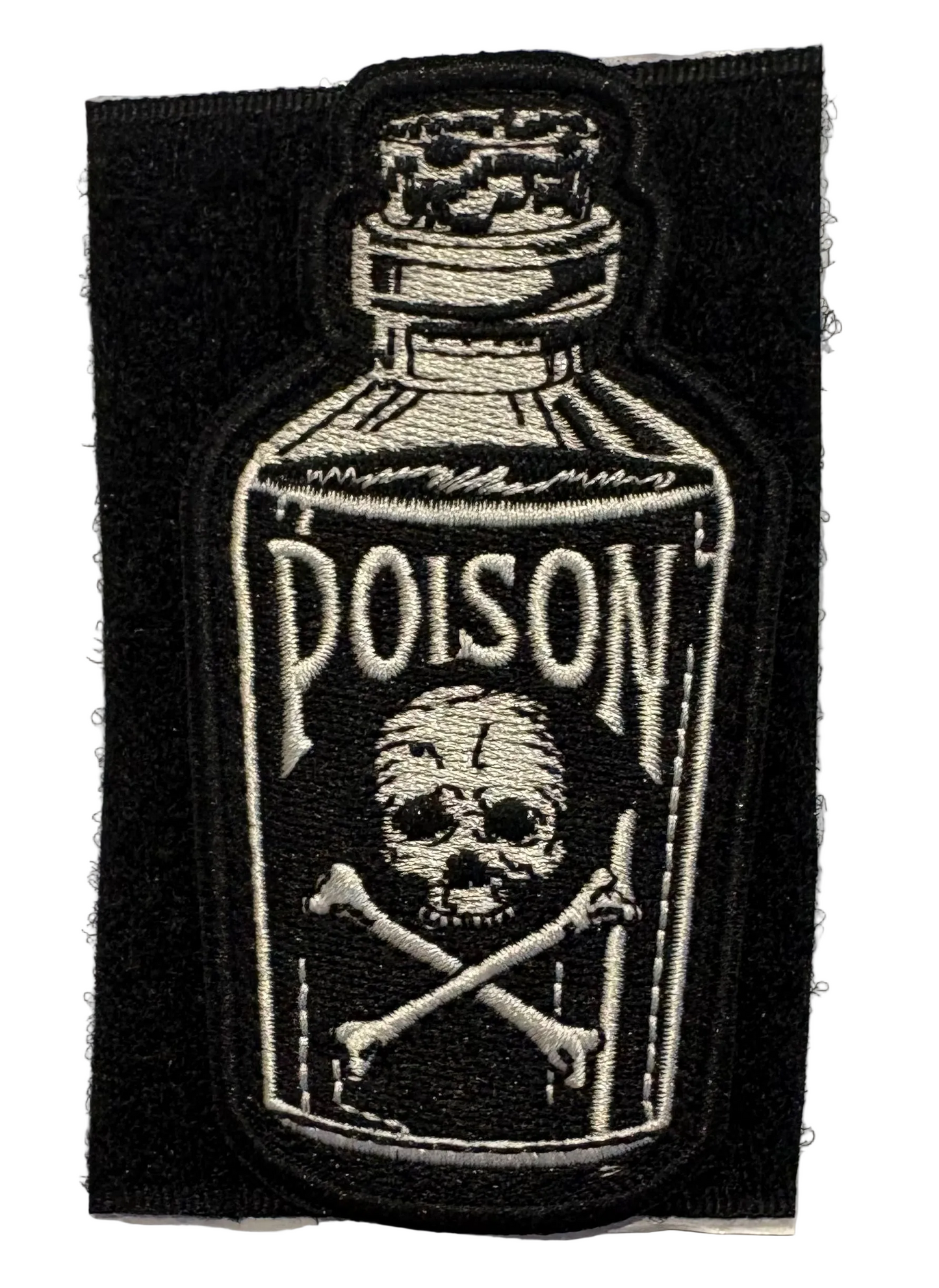 Black poison bottle patch