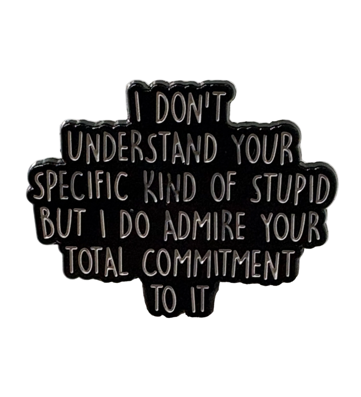 I don’t understand your specific kind of stupid pin badge