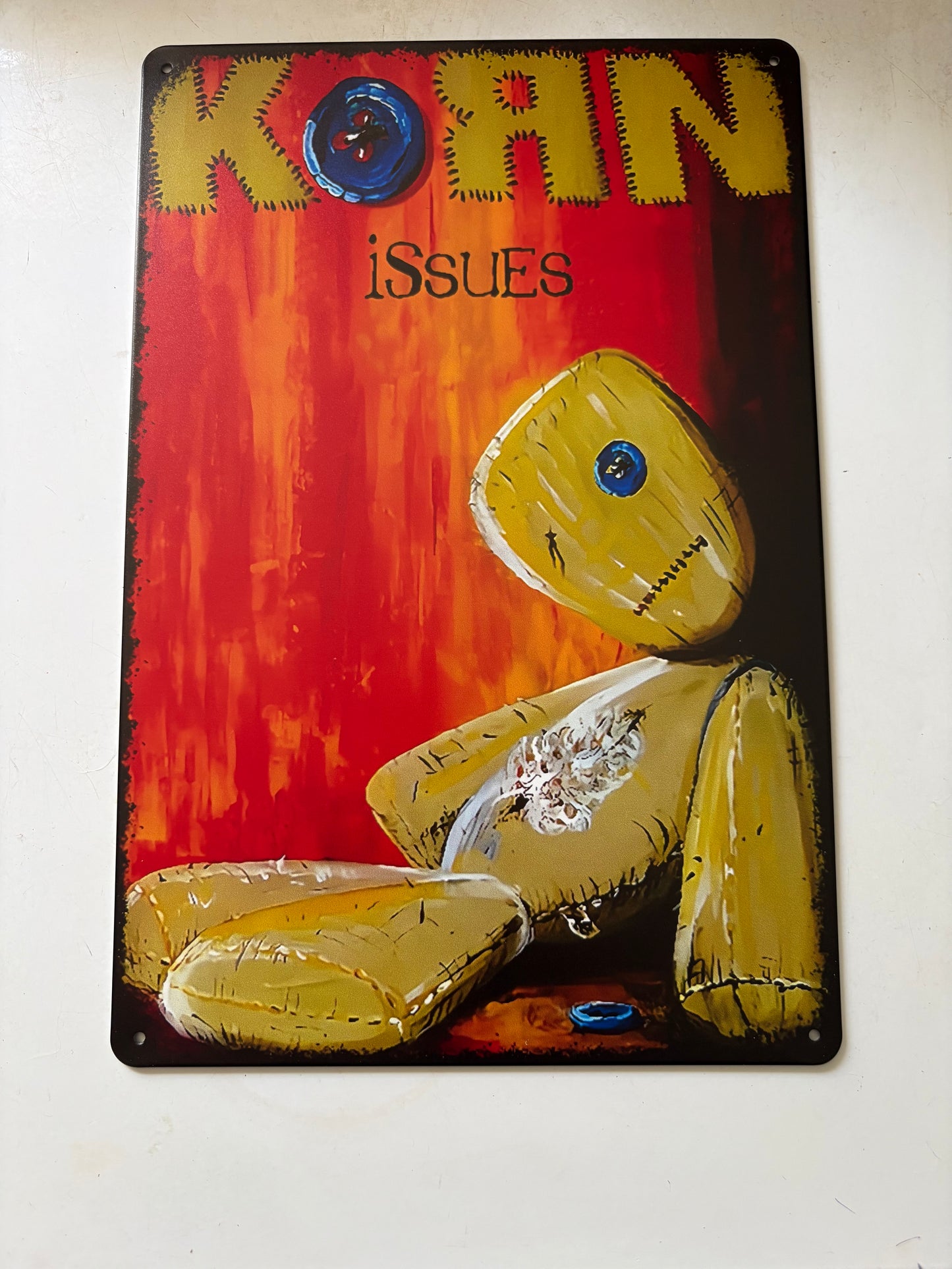 Korn Issues sign
