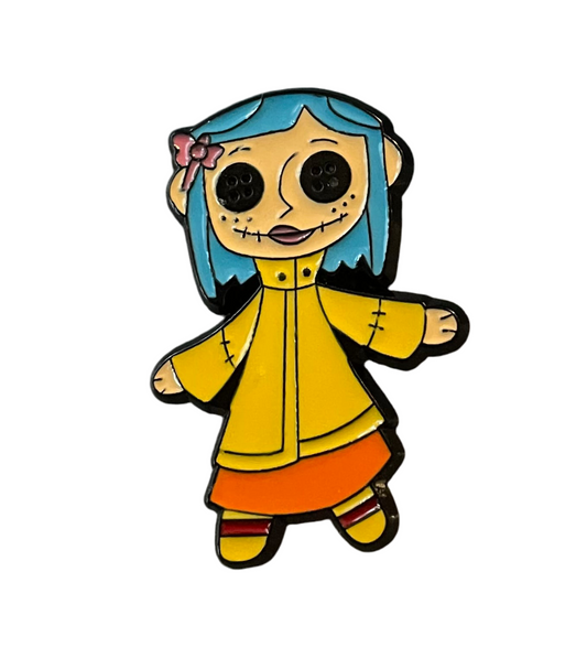 Coraline with orange skirt pin badge