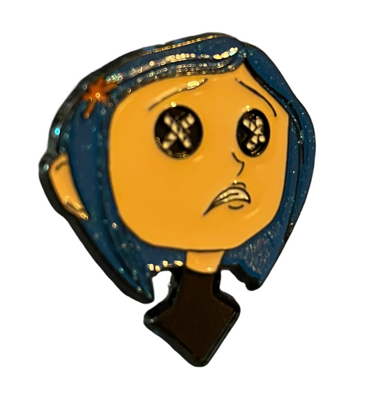 Coraline with black top pin badge