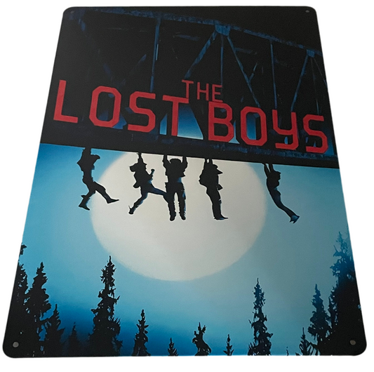 The Lost Boys hanging from the bridge sign