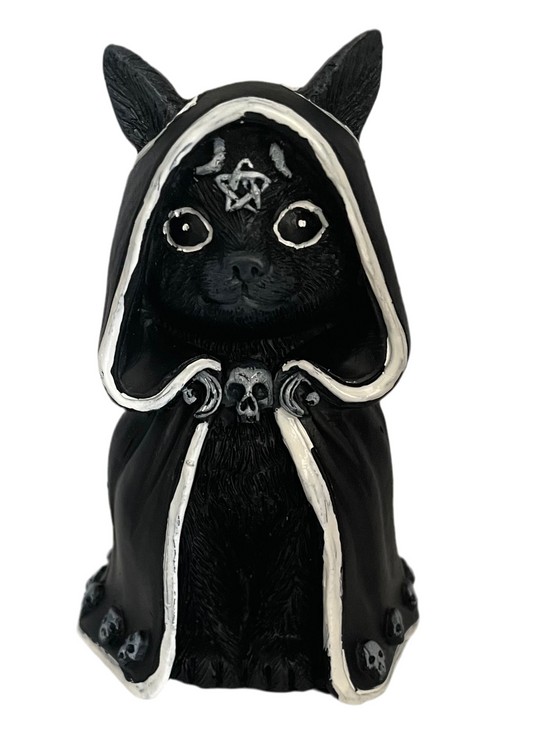 Caped cat figurine