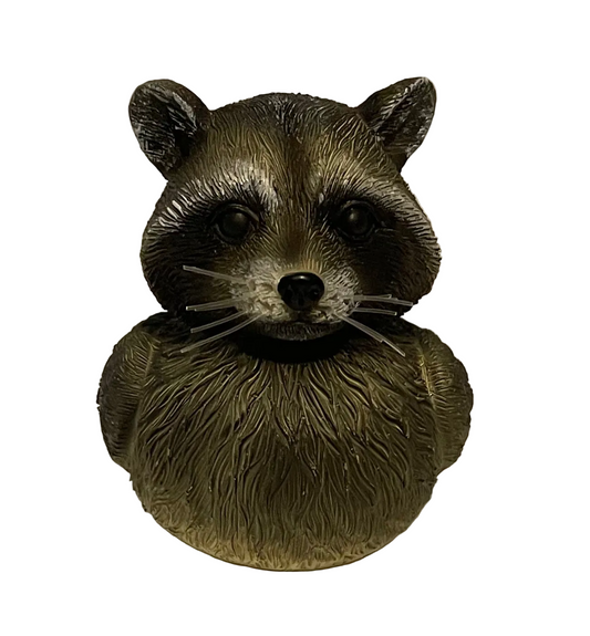 Raccoon duck figurine