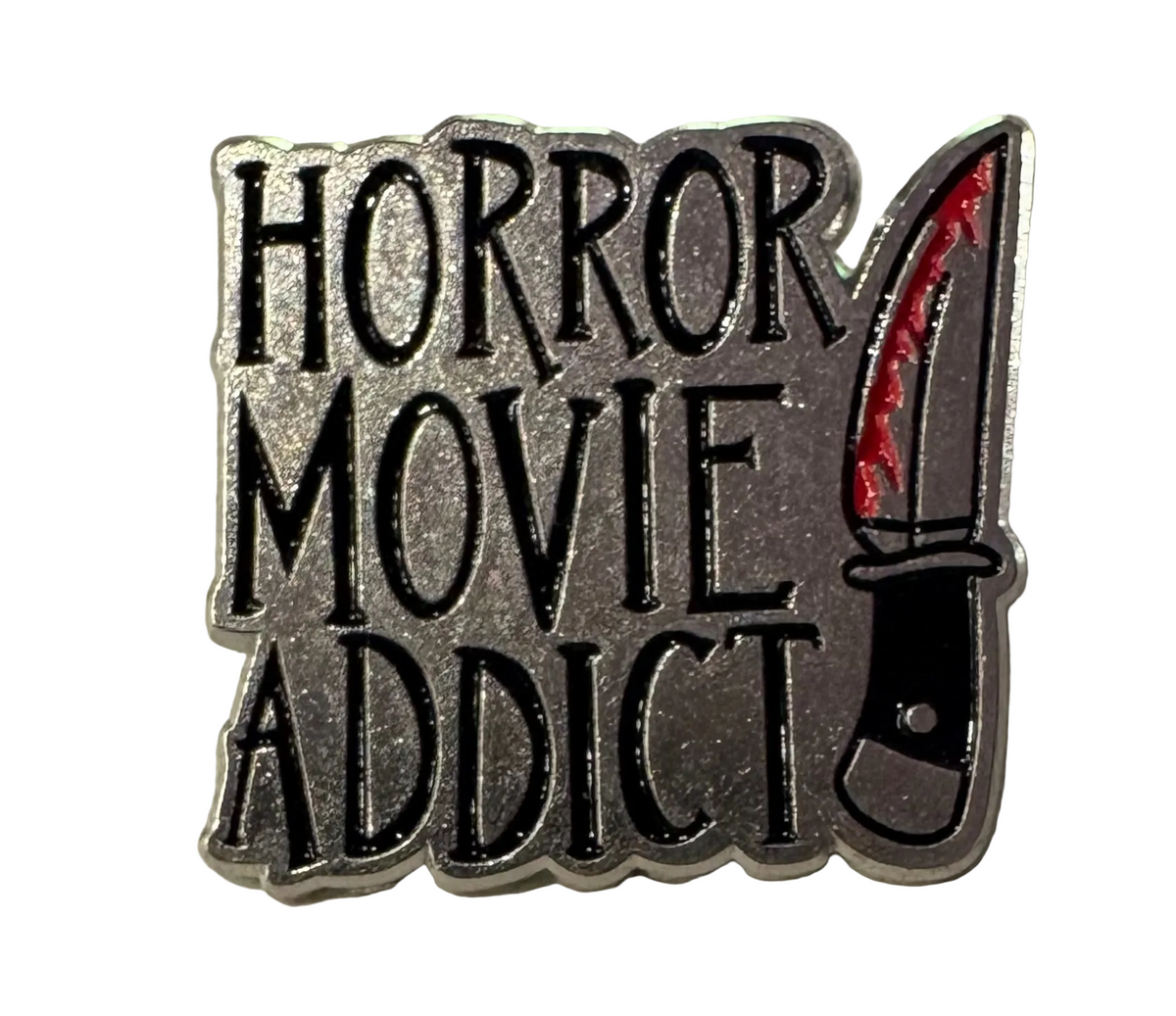 Horror movie addict pin badge
