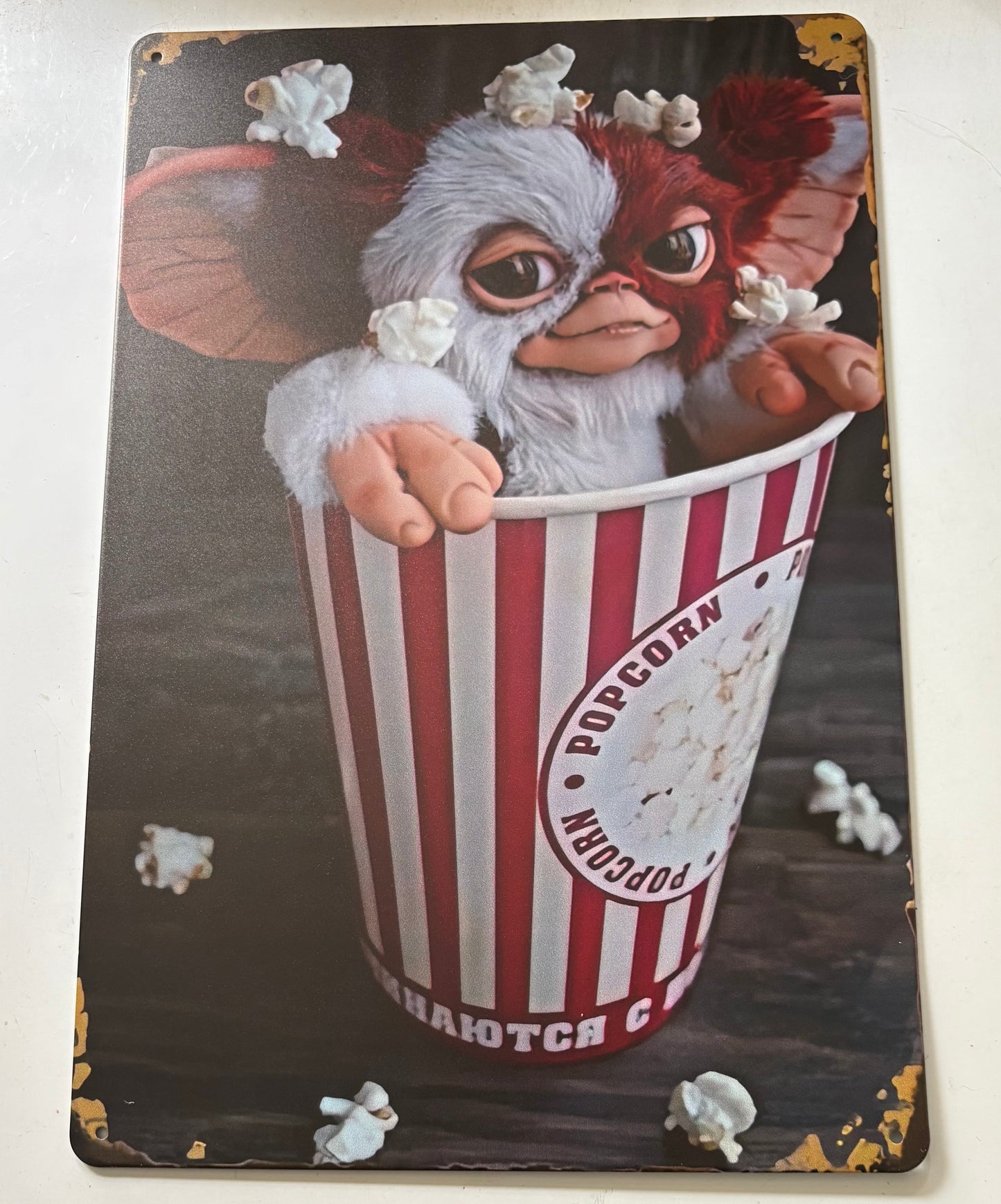 Gremlins Gizmo in popcorn bucket sign
