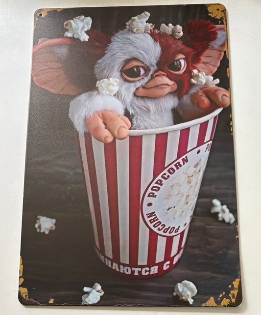 Gremlins Gizmo in popcorn bucket sign
