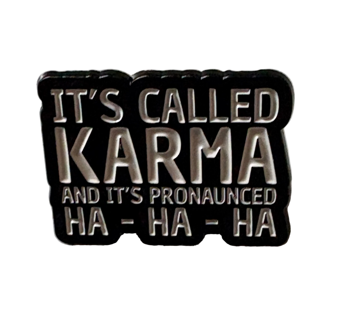 It’s called Karma pin badge