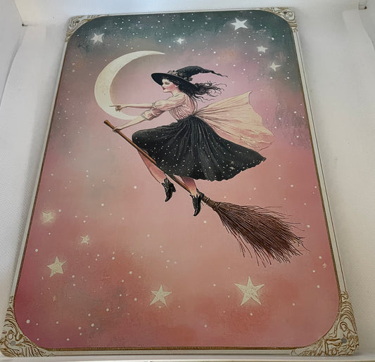 Witch on broomstick sign