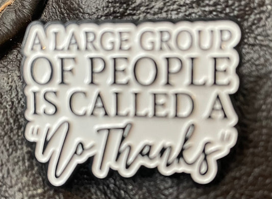 A large group of people is called a “no thanks” pin badge