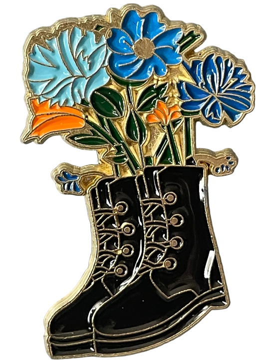 Boots and flowers pin badge