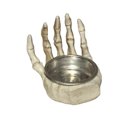 Skull palm candle holder