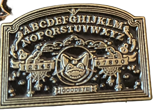 Spirit board pin badge