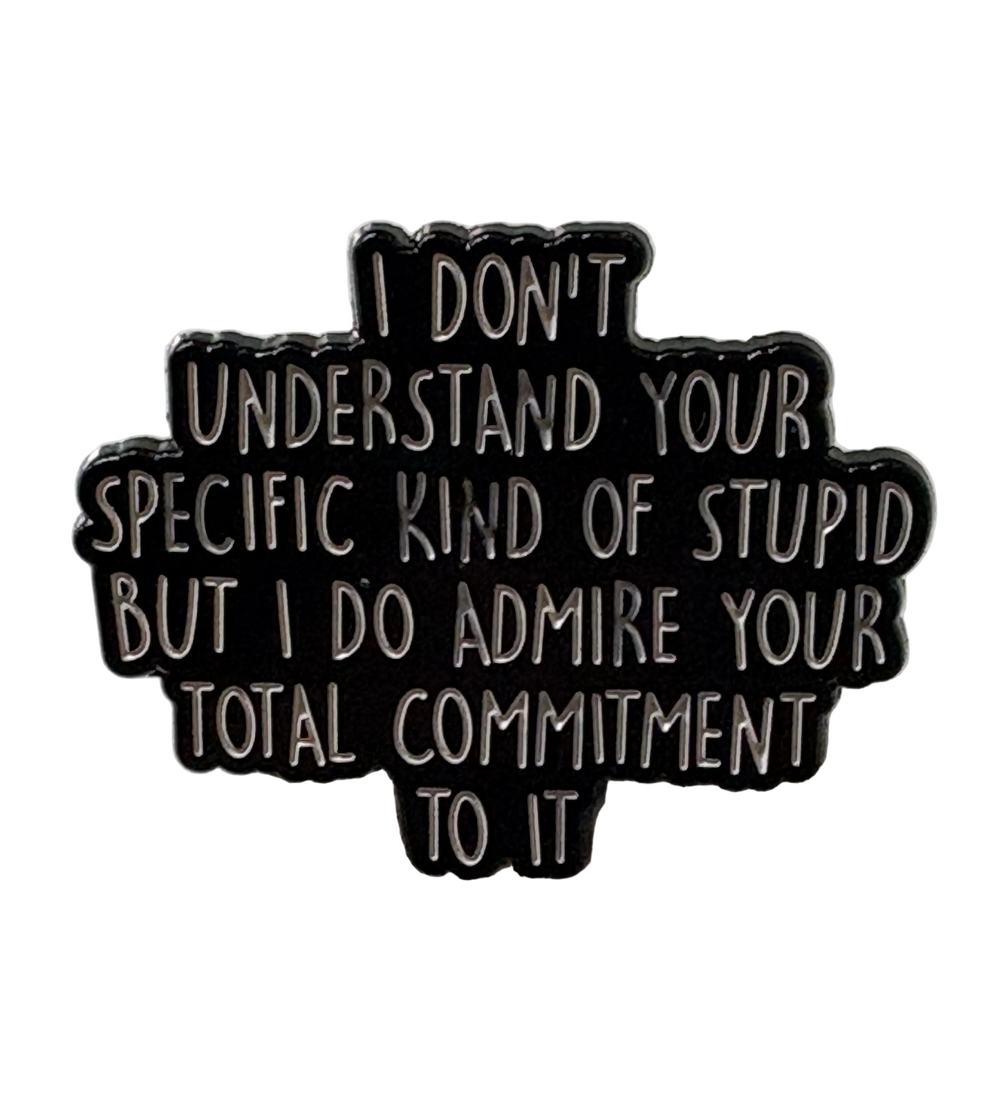 I don’t understand your specific kind of stupid pin badge